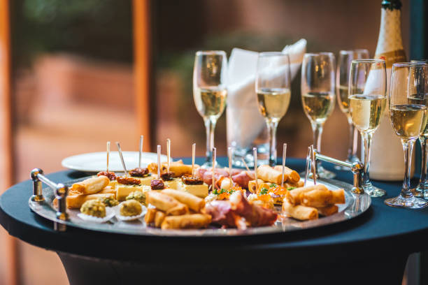 Catering service food and champagne glasses in a restaurant stock photo