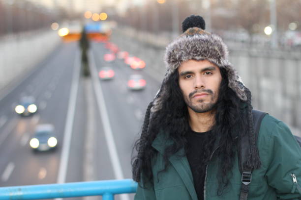 istock Gorgeous urban eskimo man with warm clothing 1180014586