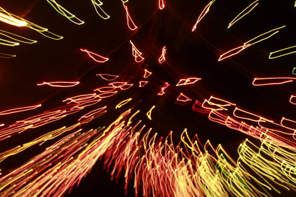 istock Glowing abstract Colorful light trail lines on dark background. 1180014627
