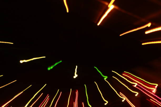 istock Glowing abstract Colorful light trail lines on dark background. 1180014674