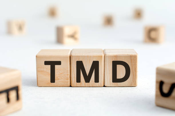 istock TMD - acronym from wooden blocks with letters 1180016526