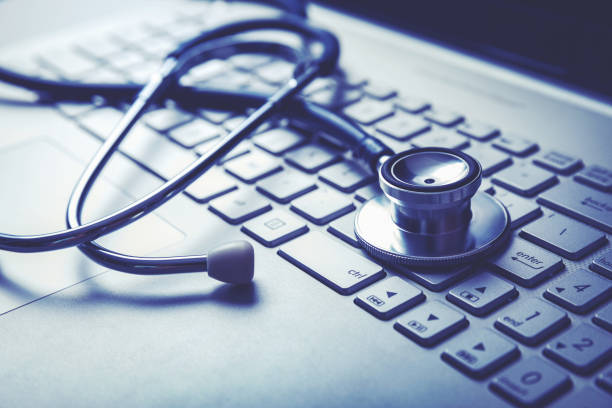 istock medical stethoscope on laptop keyboard. computer diagnostic or e-health concept 1180020377