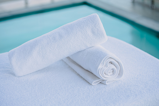 Still life shot of two towels placed one against the other at a day spa