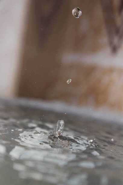 istock water drops in the water 1180024600