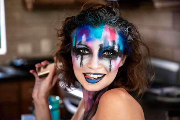 istock Creative fantasy Halloween face art colorful makeup 1180024838