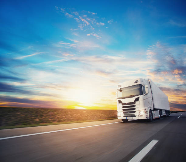 istock European truck vehicle with dramatic sunset light 1180029623