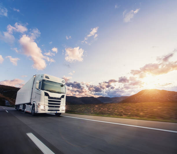 istock European truck vehicle with dramatic sunset light 1180030136
