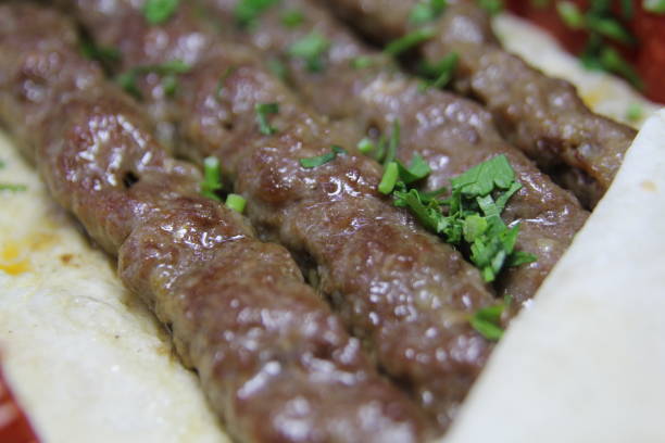 istock turkish kebab fried meat and tomatoes 1180031805