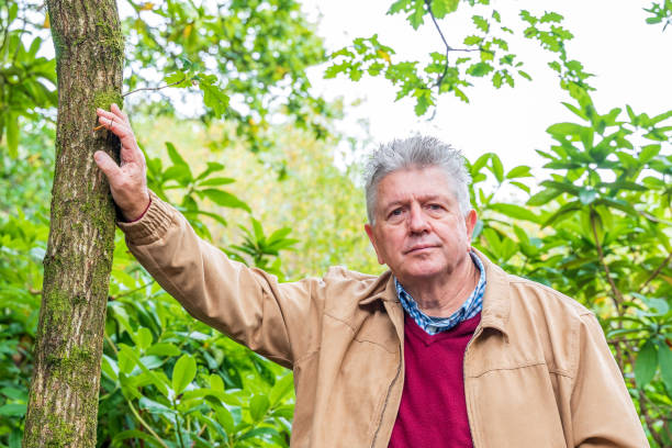 istock Active senior man in countryside portrait 1180032924