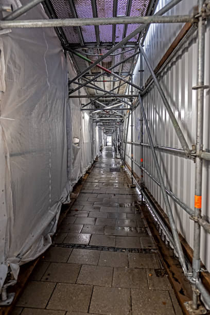 istock temporary passage for pedestrians on a construction site 1180038966
