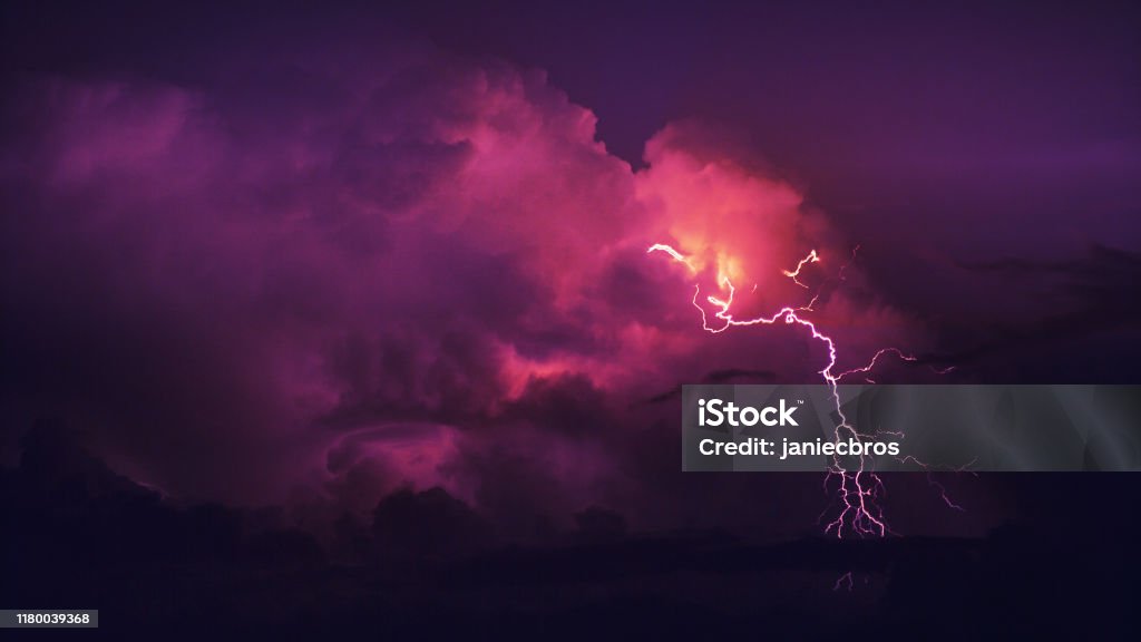 Thunderstor. Thunderstorm and beautiful colorful clouds. Close-up Lightning Stock Photo