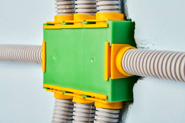 istock Flexible PVC conduit is connected to junction box. 1180040211