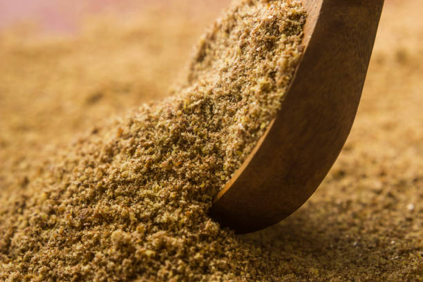 istock Ground, crushed, milled flaxseed, linseed in wooden spoon 1180040231