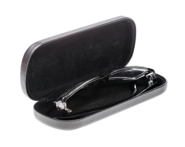 istock eyeglasses in black case isolated on white 1180040553