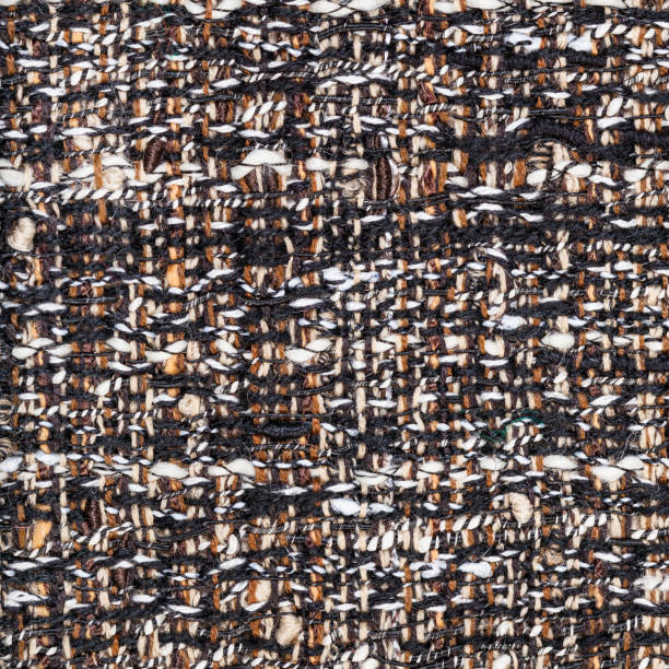istock weaving of threads in motley boucle fabric 1180040642