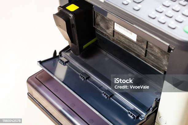 New Toner Cartridge In Laser Multi Function Device Stock Photo - Download Image Now - Arranging, Black Color, Brown