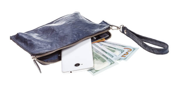 istock pouch bag with phone, cards and dollars isolated 1180045516
