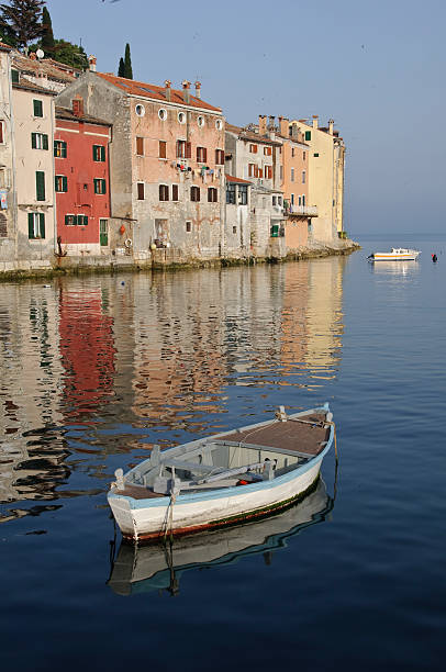 Fishing Boats and Rovinj Buildings  rovinj harbor stock pictures, royalty-free photos & images