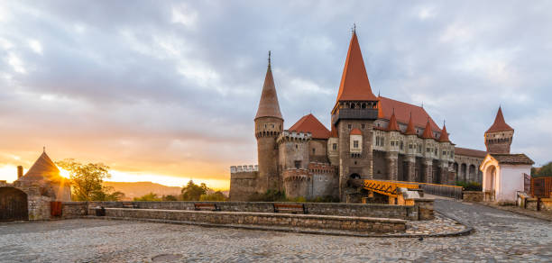 Hunedoara, Romania - October 26, 2018: Landscape with Hunyad Corvin medieval castle in the sunrise light, Hunedoara town,Transylvania landamark, Romania,Europe