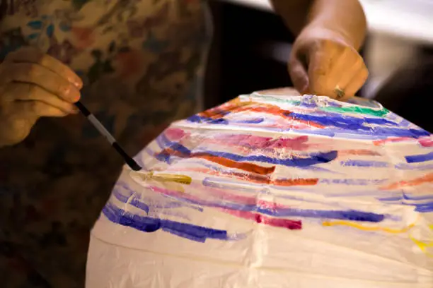 View of an Handcraft serie: Coloring the Lampshade with Watercolor