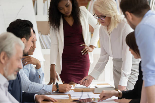 istock Multiracial employees brainstorm discussing ideas at briefing 1180069914