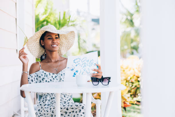 istock Young Black woman resting at summer resort 1180070166