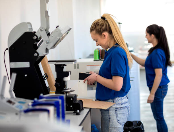 istock Female workers in printing factory 1180071290