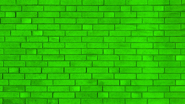 istock Vibrant green color new brick wall texture background. 1180075100