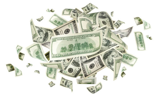 istock Hundred dollar bill. Falling money isolated background. American 1180075365