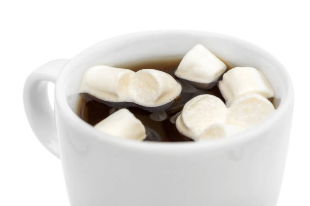 istock Hot coffee with marshmallow. Close up. Isolated on white. 1180075504
