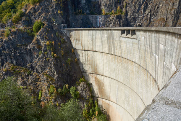 istock Hydropower construction, waterworks Dam Vidrau on Transfagarash highway in Romania. Dam and reservoir on Lake Vidraru. 1180076542