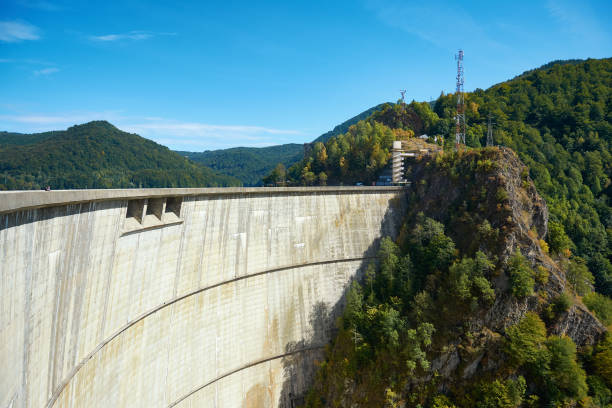 istock Hydropower construction, waterworks Dam Vidrau on Transfagarash highway in Romania. Dam and reservoir on Lake Vidraru. 1180076546