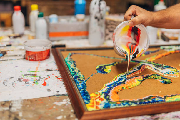 Artist painting with acrylic colors