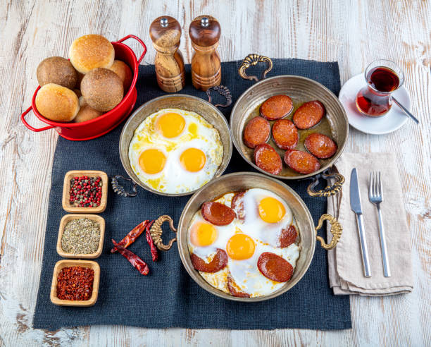 istock Breakfast; fried eggs, sausage (sucuklu) eggs, fried sausage (sucuk) . Restaurant breakfast Concept. 1180078520
