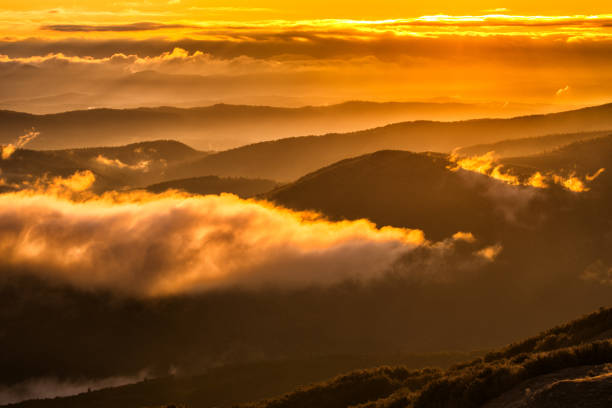 istock Splendid mountain sunrise. Mountains silhouettes on a beauty background. 1180079993