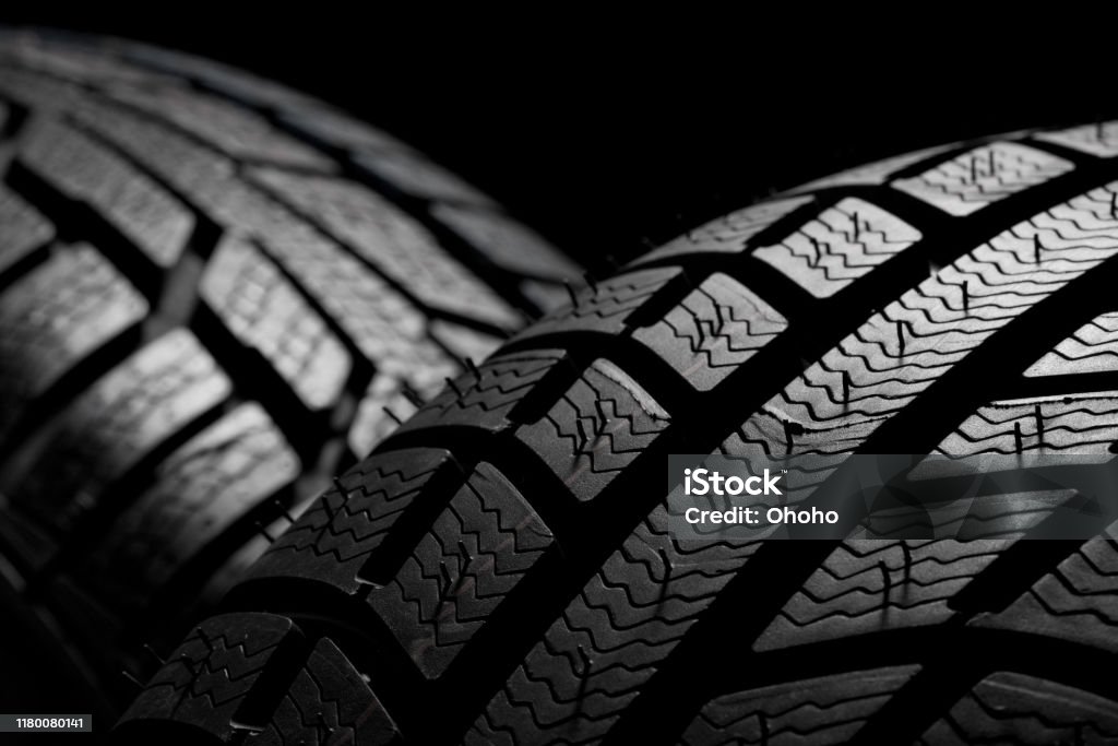 Winter tire Close up of the winter tires Tire - Vehicle Part Stock Photo