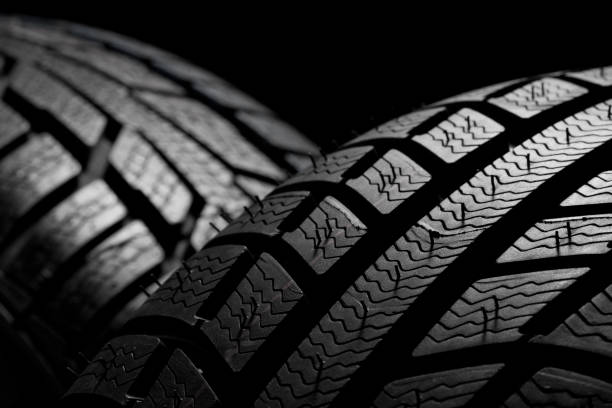 Winter tire Close up of the winter tires car wheel stock pictures, royalty-free photos & images