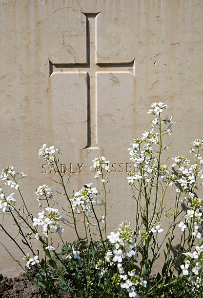 istock Cross on a tombstone with inscription 118008062