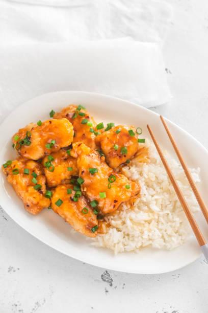 istock Portion of orange chicken 1180083023