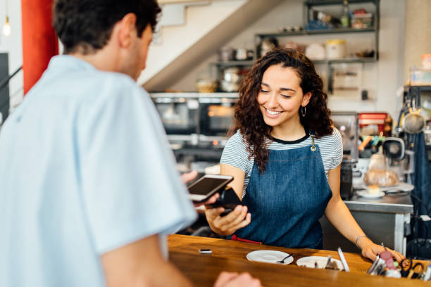 istock Contactless Payment in Coffee shop 1180084731