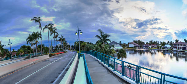 Dark clouds over Herbert R. Savage bridge, over Savage Pass, at the entrance of Marco Island, Naples, Florida