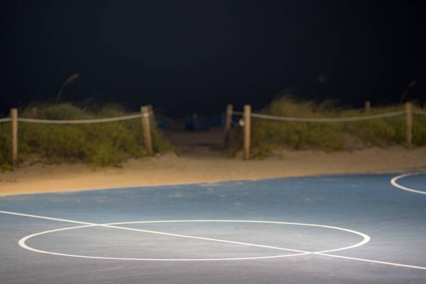 istock Night basketball half court circle painted lines 1180090734