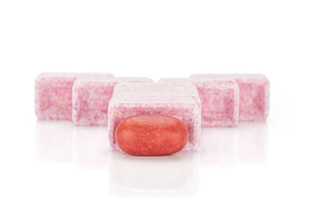 istock Sweet pastel candy isolated on white 1180098979