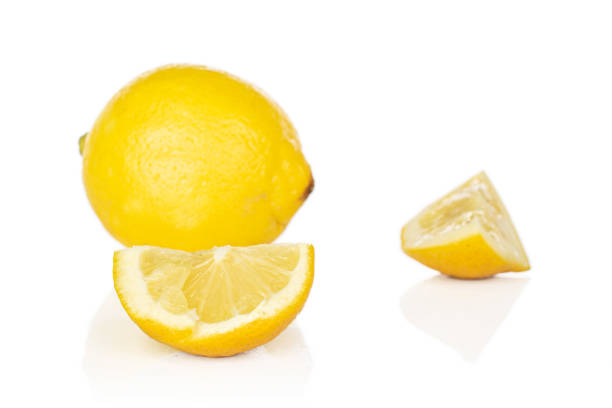 istock Fresh yellow lemon isolated on white 1180102361