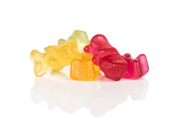 istock Colorful gummy bear isolated on white 1180102494