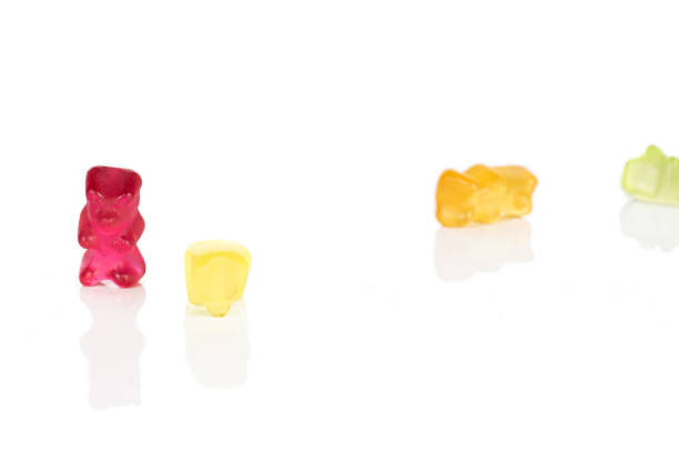 istock Colorful gummy bear isolated on white 1180102519