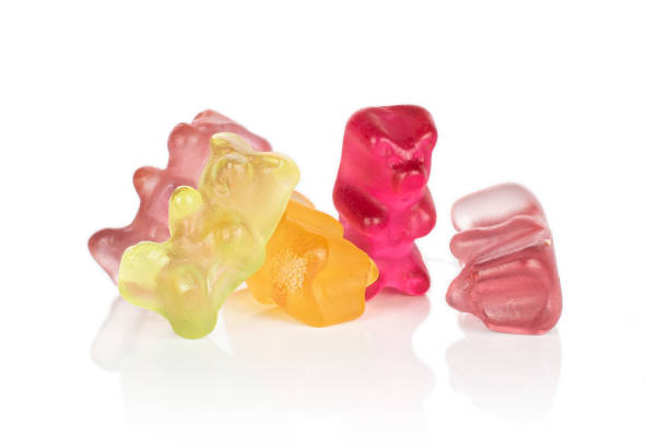 istock Colorful gummy bear isolated on white 1180102523