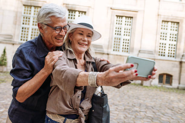 istock Seniors in love walking in Paris 1180105652