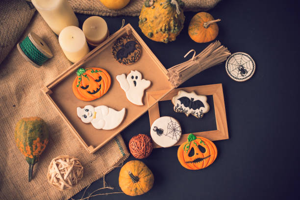 istock Halloween cookies, pumpkins and candles 1180105666