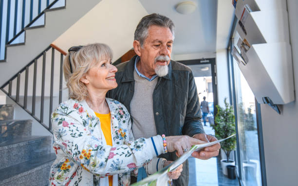 istock Senior Couple Planning Activities on Vacation 1180105765